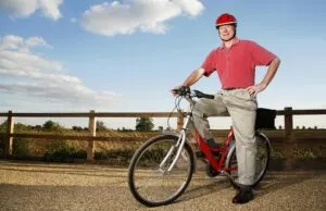 50 year old man on bike exercising